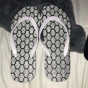 never worn ivory ella flip flops